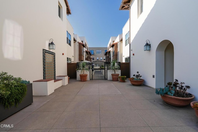 820 Mission St Unit 208, South Pasadena, CA 91030 - view of concrete driveway featuring a gate and a residential view