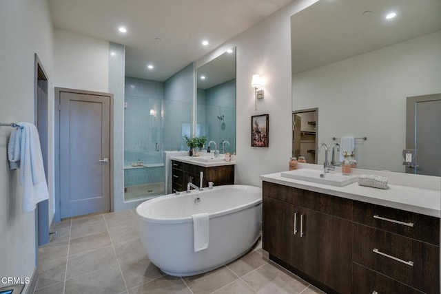820 Mission St Unit 208, South Pasadena, CA 91030 - full bath featuring a shower stall, vanity, a soaking tub, tile patterned floors, and recessed lighting