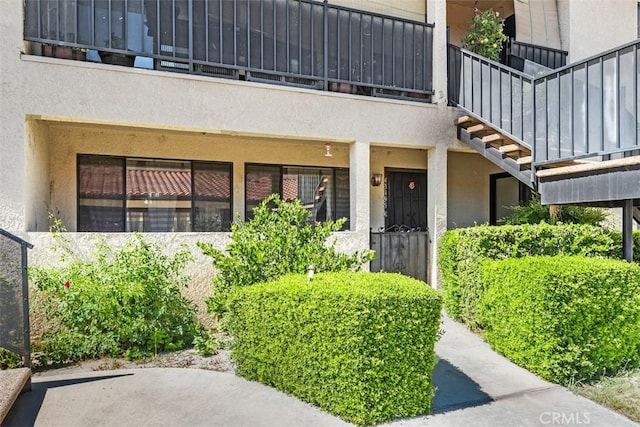 43195 Andrade Ave Unit K, Hemet, CA 92544 - entrance to property with a balcony and stucco siding