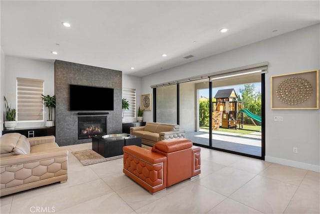 20720 W Liana Ct, Porter Ranch, CA 91326 - living room with recessed lighting, a tiled fireplace, and light tile patterned floors