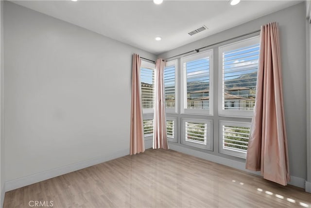 20720 W Liana Ct, Porter Ranch, CA 91326 - empty room with recessed lighting and wood finished floors