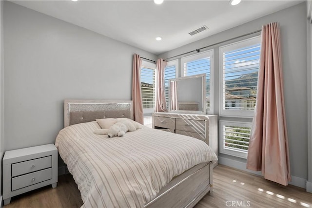 20720 W Liana Ct, Porter Ranch, CA 91326 - bedroom with multiple windows, recessed lighting, and wood finished floors