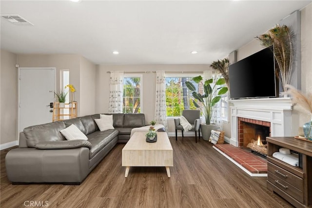 439 Acaso Dr, Walnut, CA 91789 - living room featuring wood finished floors, a fireplace, and recessed lighting