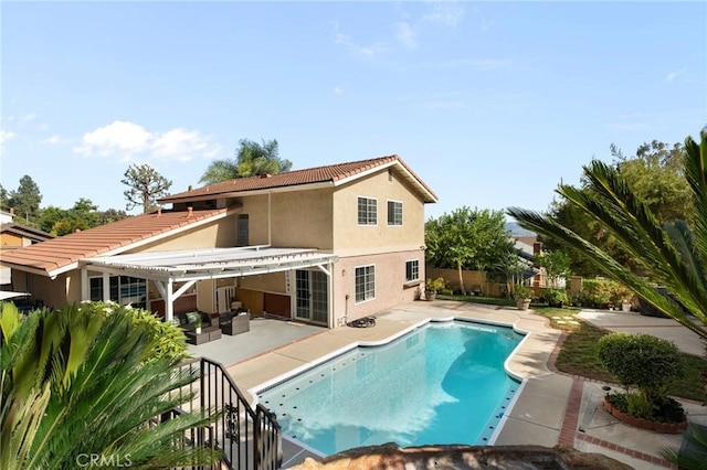 439 Acaso Dr, Walnut, CA 91789 - back of property with a patio area, a pergola, stucco siding, a fenced backyard, and a tiled roof