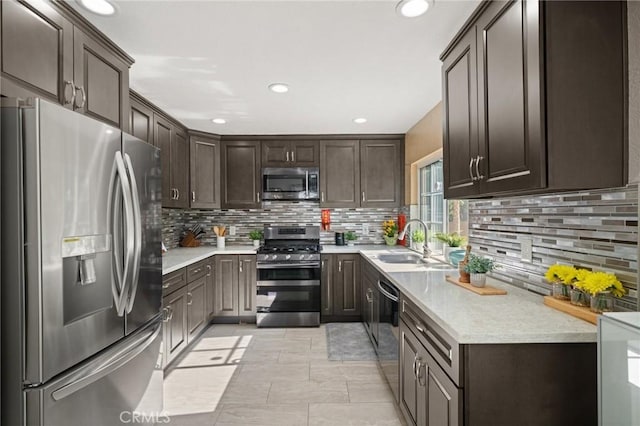 439 Acaso Dr, Walnut, CA 91789 - kitchen with stainless steel appliances, dark brown cabinetry, tasteful backsplash, and recessed lighting