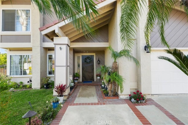 439 Acaso Dr, Walnut, CA 91789 - view of exterior entry with stucco siding and a garage