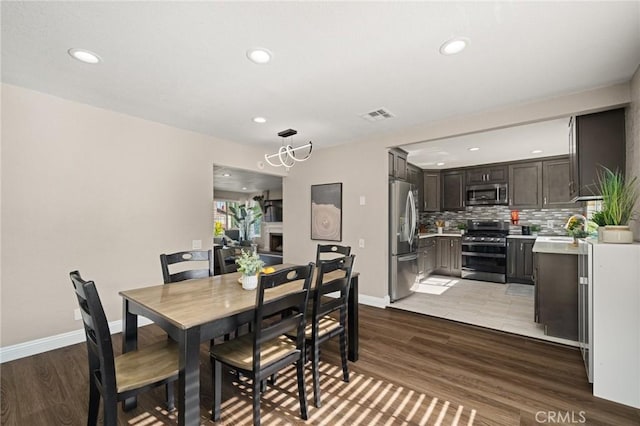 439 Acaso Dr, Walnut, CA 91789 - dining area with wood finished floors and recessed lighting