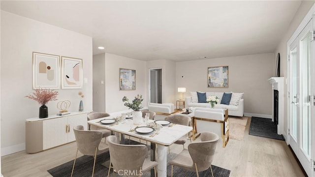 1466 Balboa St, San Luis Obispo, CA 93405 - dining space featuring light wood finished floors, recessed lighting, and a fireplace