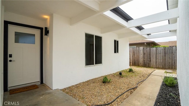 1466 Balboa St, San Luis Obispo, CA 93405 - view of exterior entry with stucco siding and a pergola