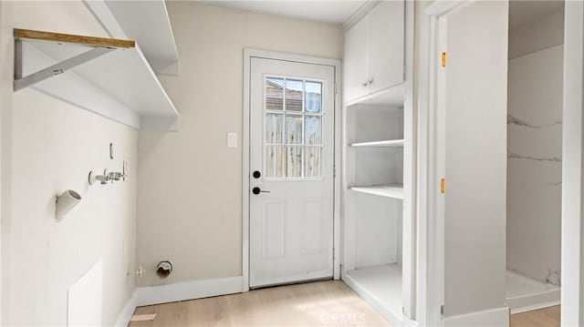 1466 Balboa St, San Luis Obispo, CA 93405 - laundry area with light wood finished floors