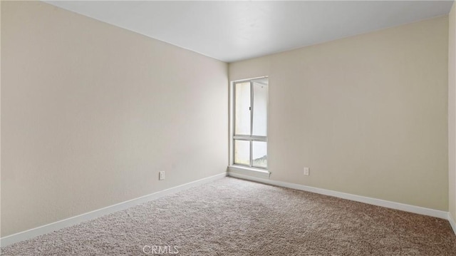 1466 Balboa St, San Luis Obispo, CA 93405 - carpeted spare room featuring baseboards