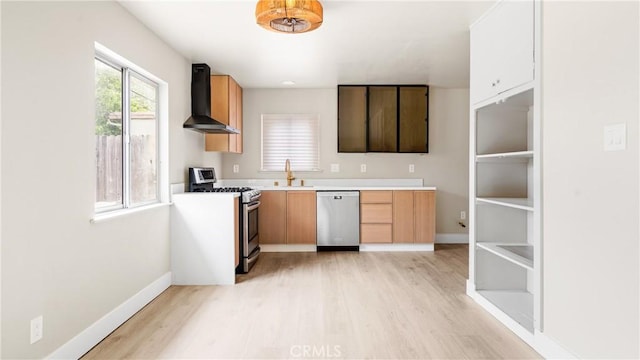 1466 Balboa St, San Luis Obispo, CA 93405 - kitchen with appliances with stainless steel finishes, wall chimney range hood, light wood-style floors, and light countertops