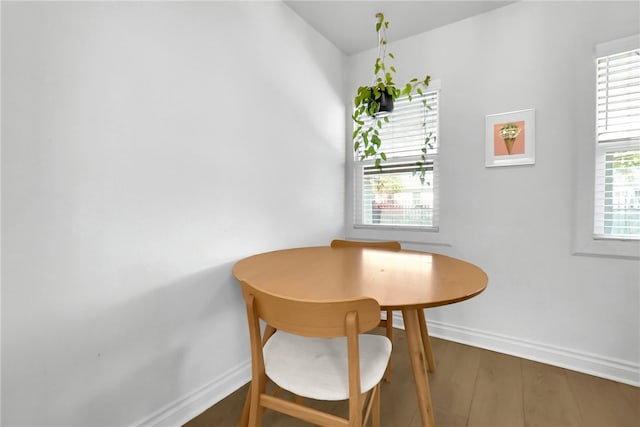1640 Magnolia Ave, Long Beach, CA 90813 - dining room featuring baseboards and wood finished floors