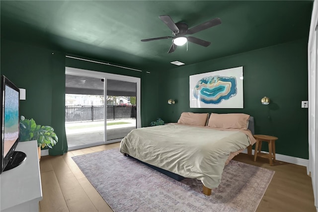 1640 Magnolia Ave, Long Beach, CA 90813 - bedroom with access to outside, a ceiling fan, and wood finished floors
