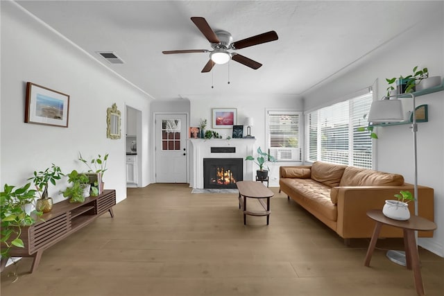 1640 Magnolia Ave, Long Beach, CA 90813 - living room with a ceiling fan, a fireplace with flush hearth, and wood finished floors
