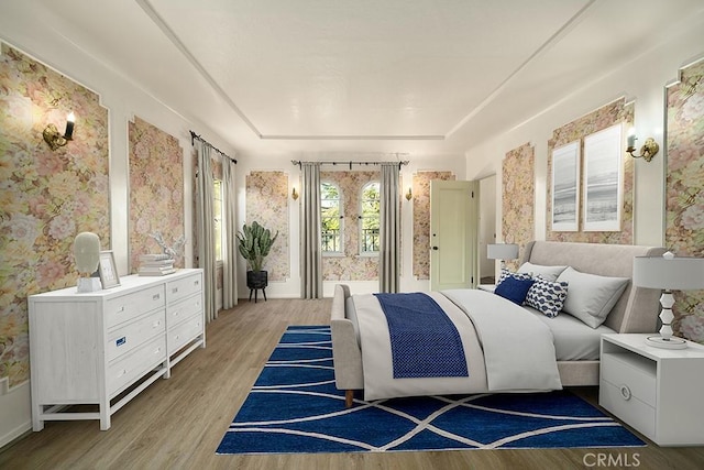 1161 N Everett St, Glendale, CA 91207 - bedroom featuring wallpapered walls, light wood finished floors, access to outside, and a tray ceiling