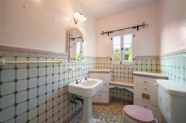 1161 N Everett St, Glendale, CA 91207 - bathroom with wainscoting, tile walls, and tile patterned floors
