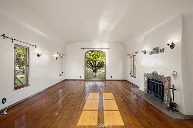 1161 N Everett St, Glendale, CA 91207 - unfurnished living room featuring a fireplace, wood-type flooring, and vaulted ceiling