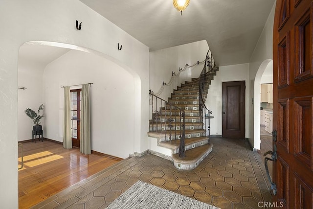 1161 N Everett St, Glendale, CA 91207 - tiled foyer entrance with arched walkways and stairs