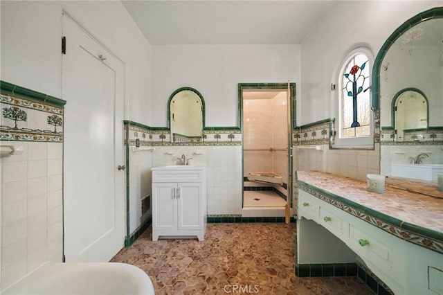 1161 N Everett St, Glendale, CA 91207 - bathroom with tile walls, a stall shower, vanity, and wainscoting
