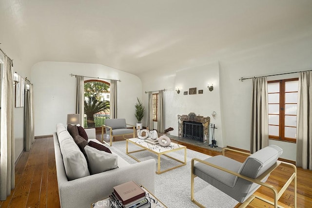 1161 N Everett St, Glendale, CA 91207 - living room with hardwood / wood-style floors, a fireplace, and lofted ceiling