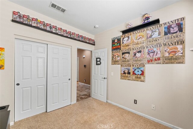 1706 Regents St, Lancaster, CA 93534 - unfurnished bedroom with carpet floors and a closet