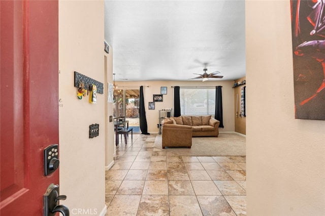 1706 Regents St, Lancaster, CA 93534 - living area featuring a ceiling fan and light colored carpet