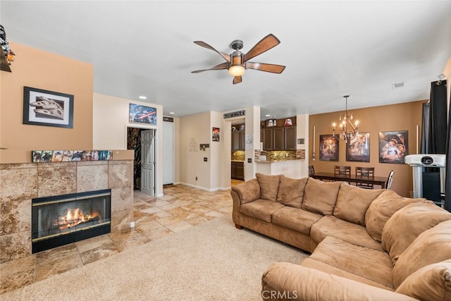 1706 Regents St, Lancaster, CA 93534 - living room with a chandelier, ceiling fan, and a fireplace