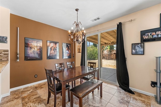 1706 Regents St, Lancaster, CA 93534 - dining room with a chandelier and baseboards