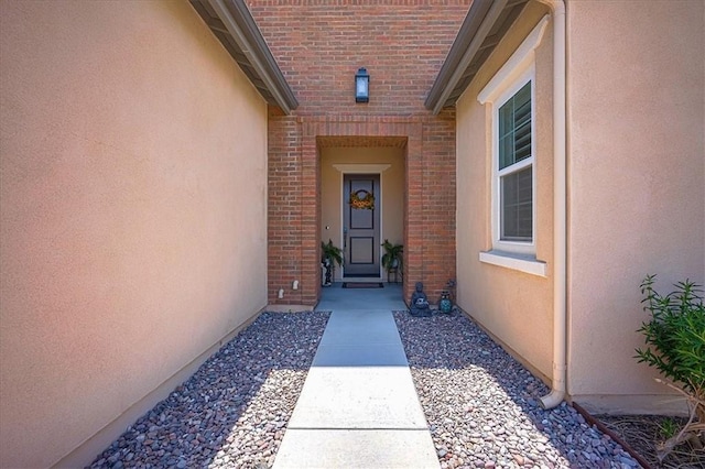 13471 Planet Ct, Riverside, CA 92503 - view of exterior entry featuring brick siding and stucco siding