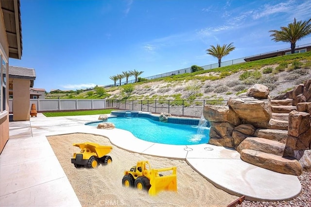 13471 Planet Ct, Riverside, CA 92503 - view of swimming pool with a patio, a fenced backyard, and a pool with connected hot tub