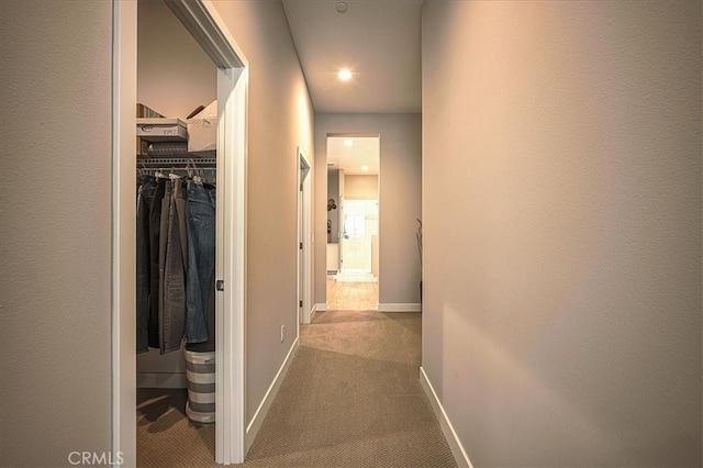 13471 Planet Ct, Riverside, CA 92503 - corridor featuring dark carpet and recessed lighting