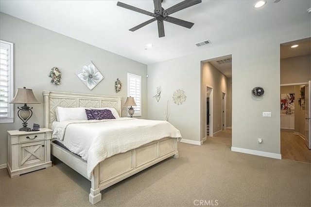 13471 Planet Ct, Riverside, CA 92503 - bedroom with light colored carpet, recessed lighting, and ceiling fan