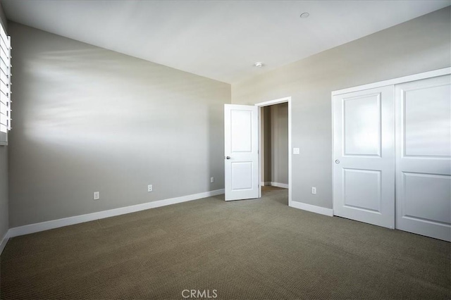 13471 Planet Ct, Riverside, CA 92503 - unfurnished bedroom with carpet, vaulted ceiling, and a closet