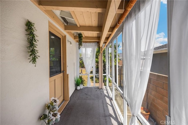 17342 Almelo Ln, Huntington Beach, CA 92649 - unfurnished sunroom featuring beam ceiling