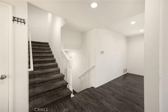17342 Almelo Ln, Huntington Beach, CA 92649 - staircase featuring wood finished floors and recessed lighting