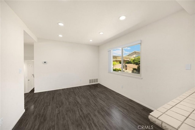 17342 Almelo Ln, Huntington Beach, CA 92649 - empty room featuring dark wood-type flooring and recessed lighting