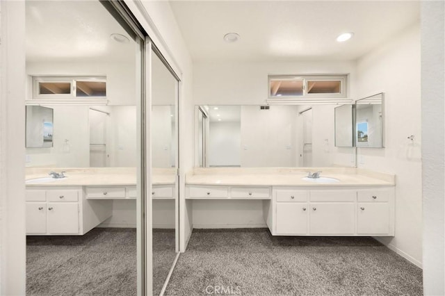 17342 Almelo Ln, Huntington Beach, CA 92649 - bathroom with vanity, carpet floors, and recessed lighting