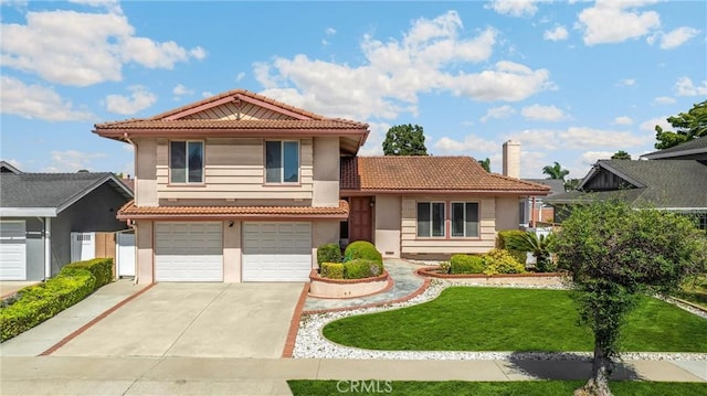 17342 Almelo Ln, Huntington Beach, CA 92649 - view of front facade with a tiled roof, driveway, stucco siding, and an attached garage