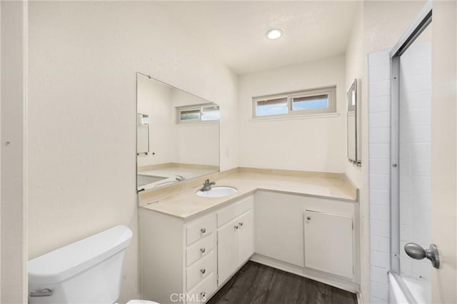 17342 Almelo Ln, Huntington Beach, CA 92649 - full bathroom featuring vanity, wood finished floors, and shower / washtub combination