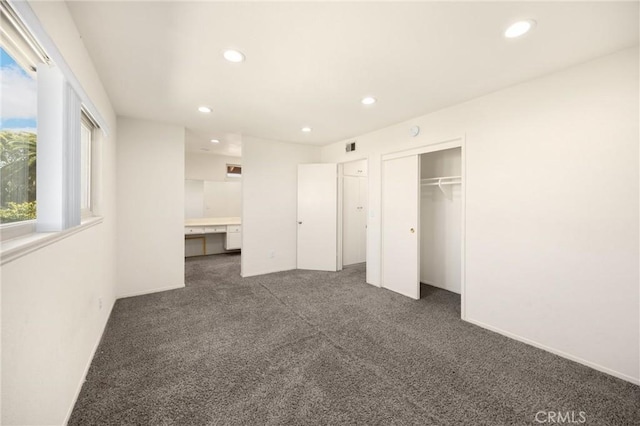 17342 Almelo Ln, Huntington Beach, CA 92649 - unfurnished bedroom with recessed lighting, carpet floors, a closet, and built in study area