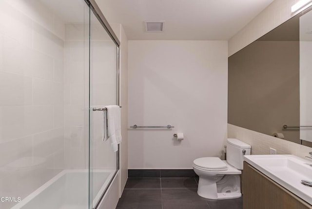 889 Francisco St Unit 802, Los Angeles, CA 90017 - full bath featuring vanity, tile patterned flooring, and bath / shower combo with glass door