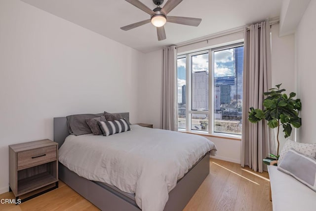 889 Francisco St Unit 802, Los Angeles, CA 90017 - bedroom featuring light wood-style floors and a ceiling fan