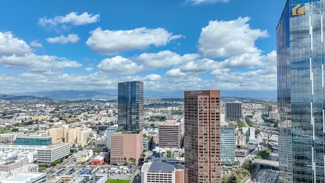 889 Francisco St Unit 802, Los Angeles, CA 90017 - city view with a mountain backdrop