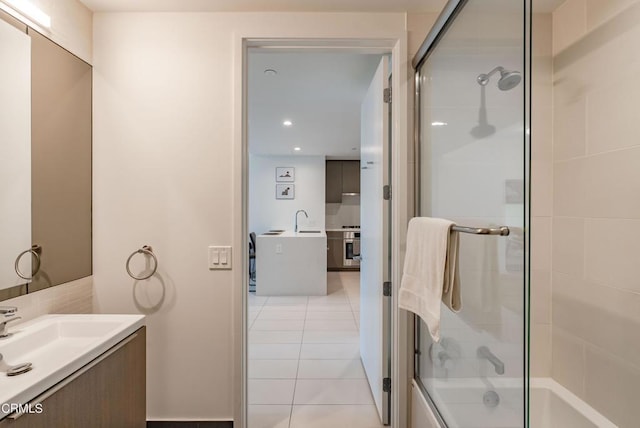 889 Francisco St Unit 802, Los Angeles, CA 90017 - bathroom featuring vanity, combined bath / shower with glass door, tile patterned floors, and recessed lighting
