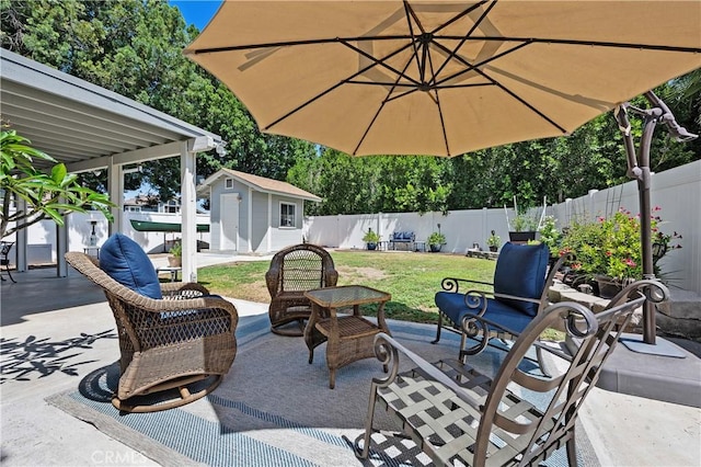 1365 Kroonen Dr, Corona, CA 92882 - fenced backyard with a patio area and a storage unit