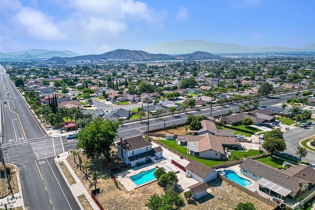 12887 Mount Vernon Ave, Grand Terrace, CA 92313 - aerial view of residential area featuring a pool area and a mountainous background