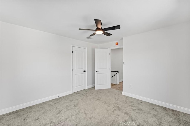 12887 Mount Vernon Ave, Grand Terrace, CA 92313 - unfurnished bedroom with carpet floors and a ceiling fan