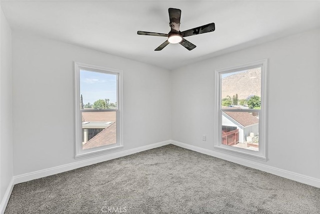 12887 Mount Vernon Ave, Grand Terrace, CA 92313 - carpeted spare room with baseboards and a ceiling fan