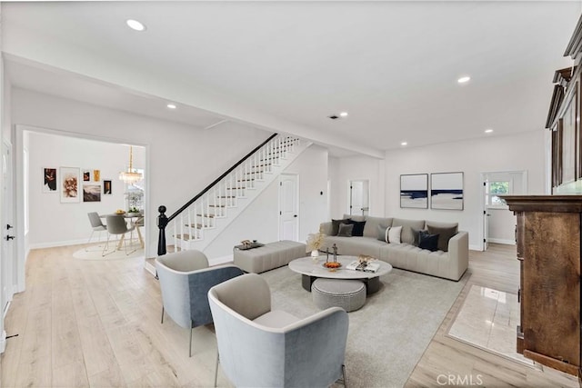 12887 Mount Vernon Ave, Grand Terrace, CA 92313 - living room with stairway, light wood-style flooring, and recessed lighting